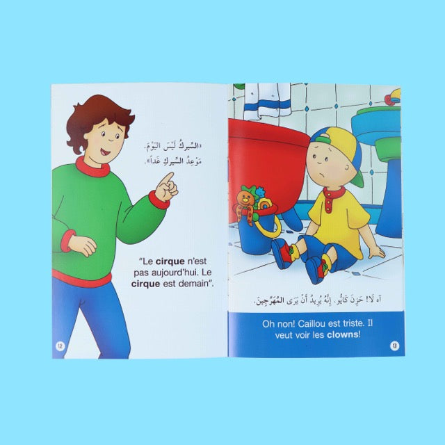Livre éducatif Caillou ouvert avec pages illustrées et contenu d’apprentissage pour enfants